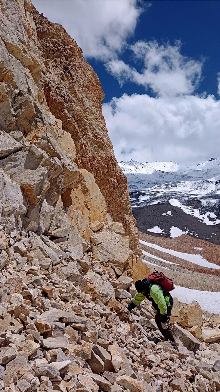 Altered yellow-orange slope at Las Estrellas, characteristic of the porphyry-margin alteration in the southern zone